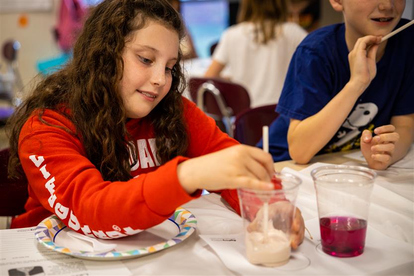 College Grove students in a science class